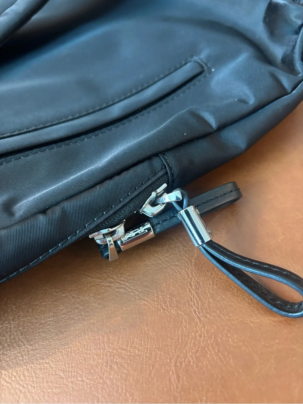 Tumi compact sling